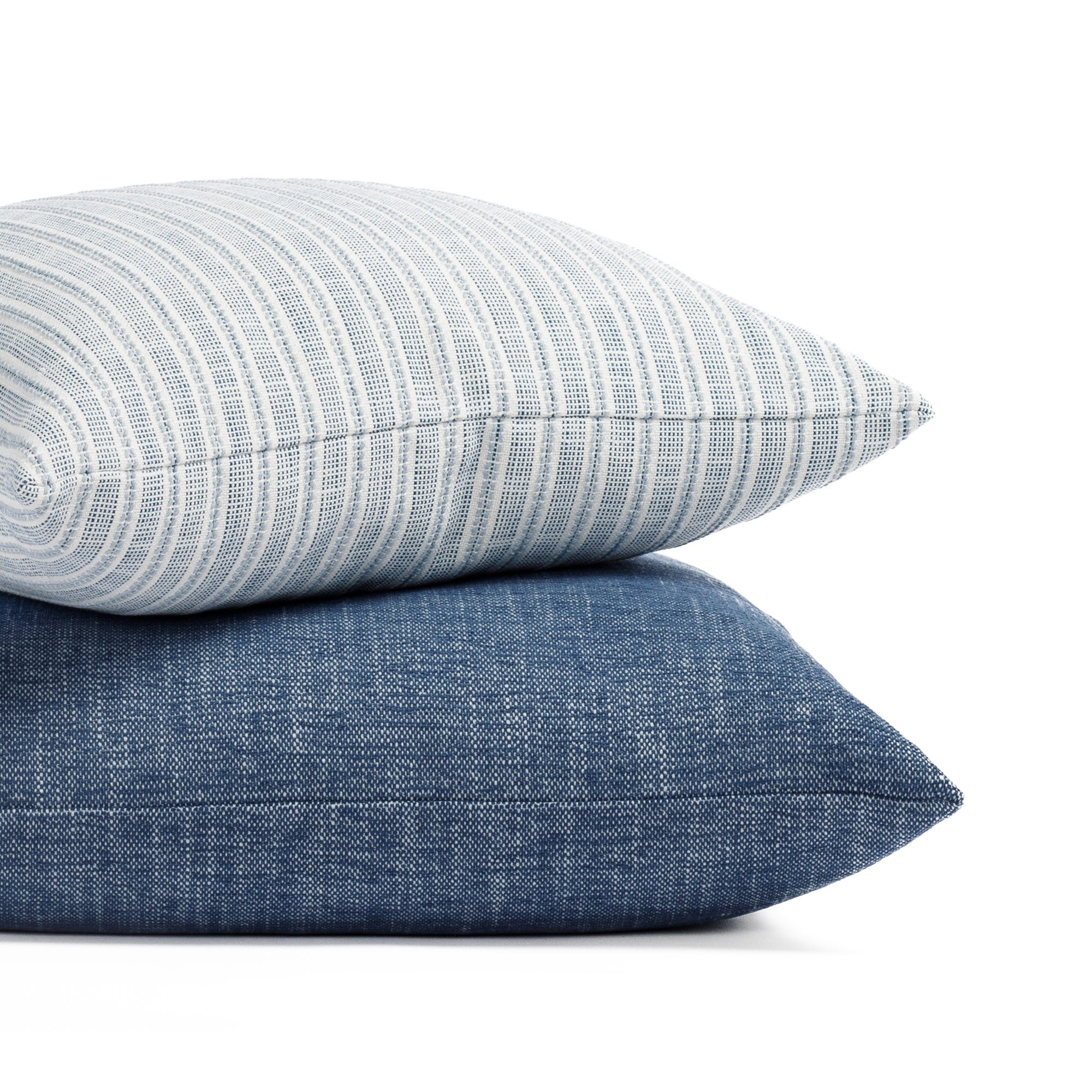 Tonic Living blue outdoor pillows - Amalfi Stripe and Parker Indigo pillows