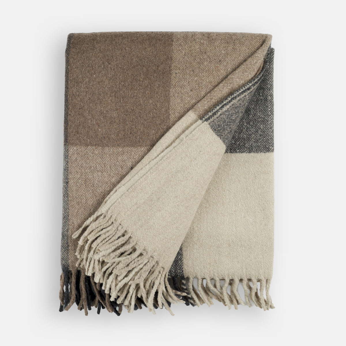 Folded Tonic Living Angus Check Wool Throw Blanket in Mink featuring a classic brown, grey, and beige check pattern.