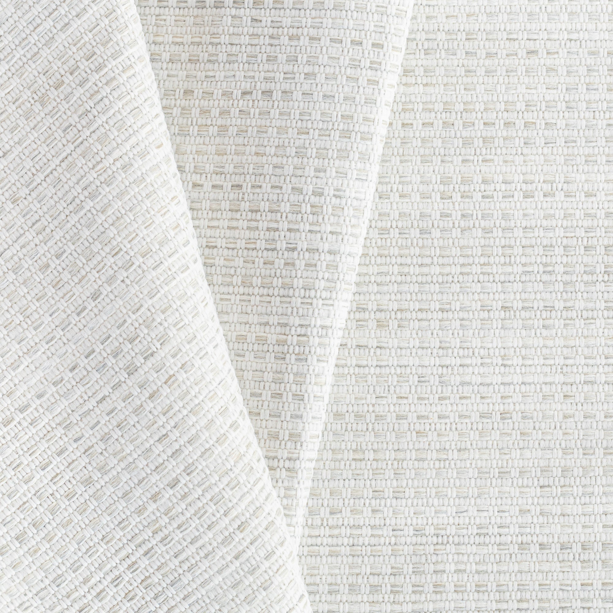 a white, oatmeal and grey basket weave textured upholstery fabric