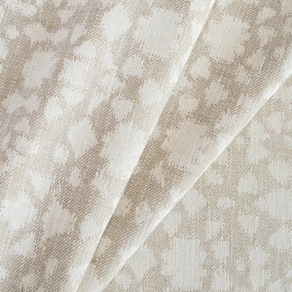 Astrid Natural, a taupe and beige abstract botanical motif pattern upholstery fabric from Tonic Living
