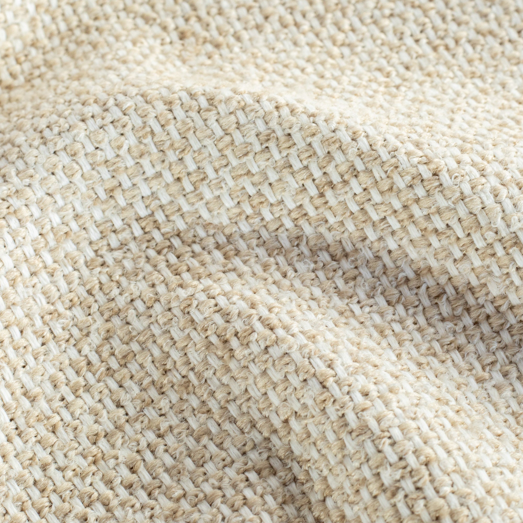 a light camel and white basket weave fabric