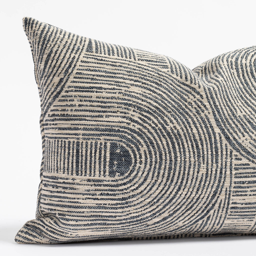 a looped arch geometric indigo blue and grey patterned lumbar pillow