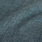 Close-up of Tonic Living Bedford Denim indigo chenille upholstery fabric with texture.