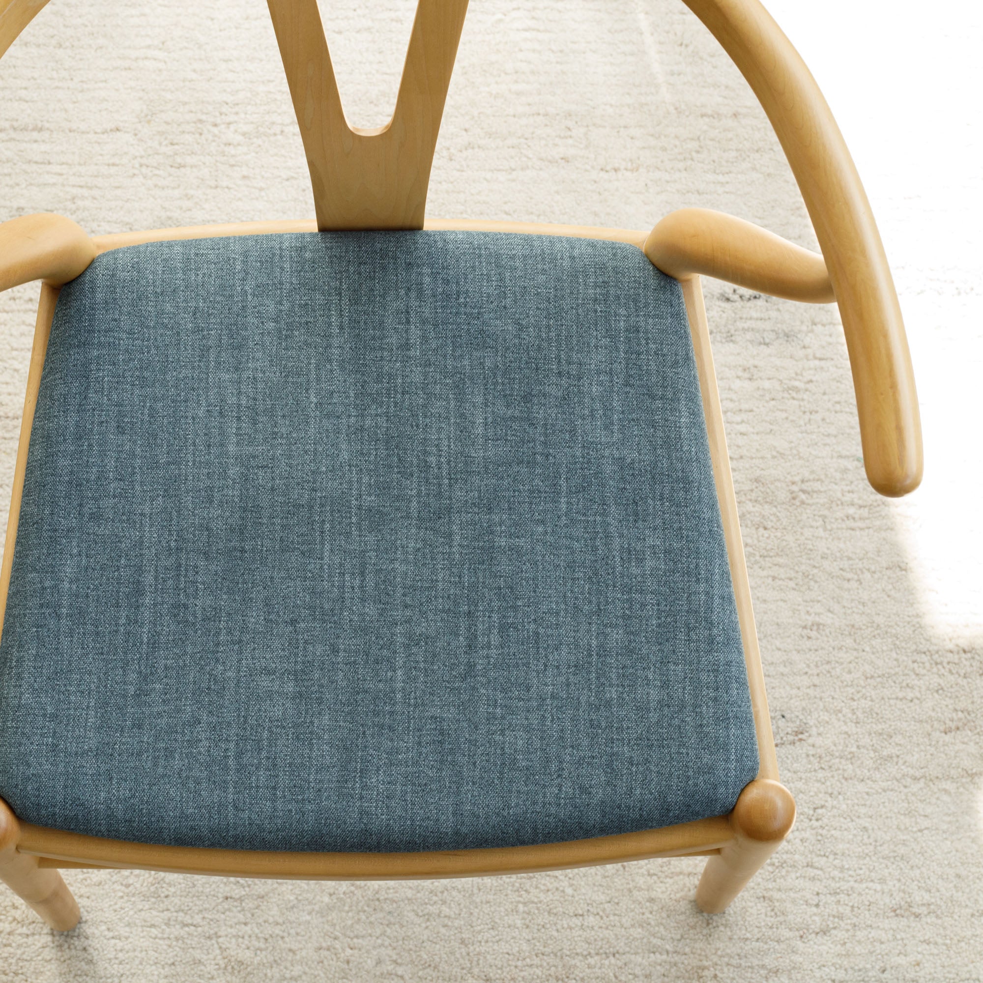 Dining chair in Tonic Living Bedford Denim chambray-blue chenille upholstery fabric.