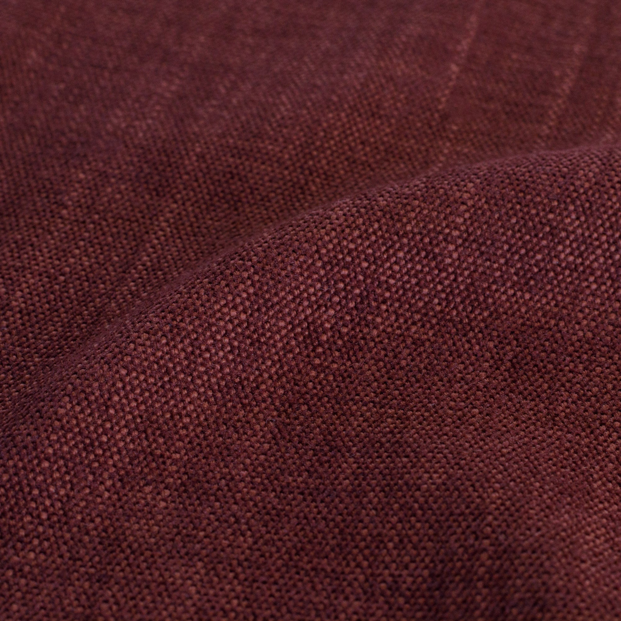 Close-up of Tonic Living Bedford Merlot dark red chenille upholstery fabric.