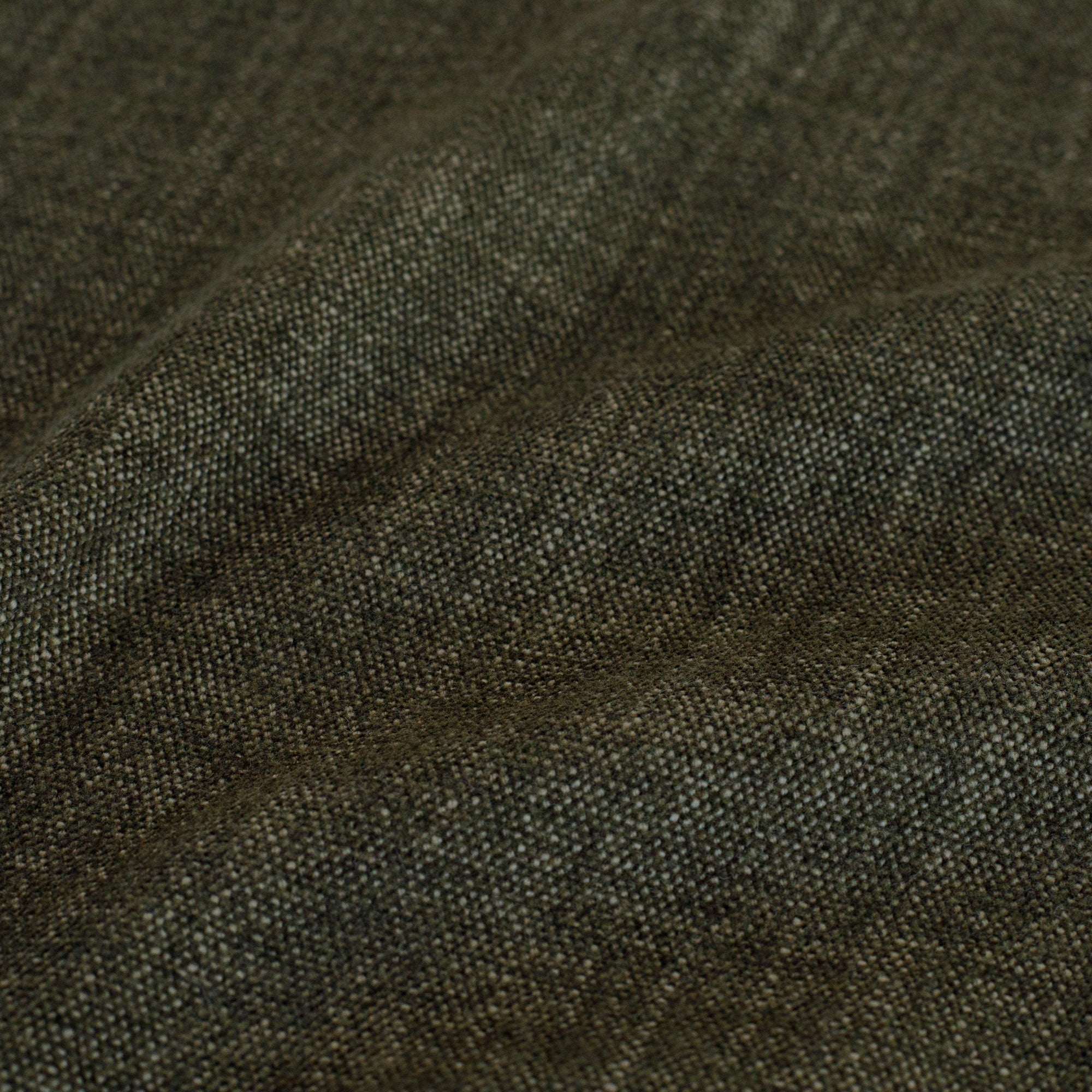 Close-up of Tonic Living Bedford Moss earthy forest-green chenille upholstery fabric.