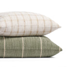 a leafy green and neutral beige pillow pairing
