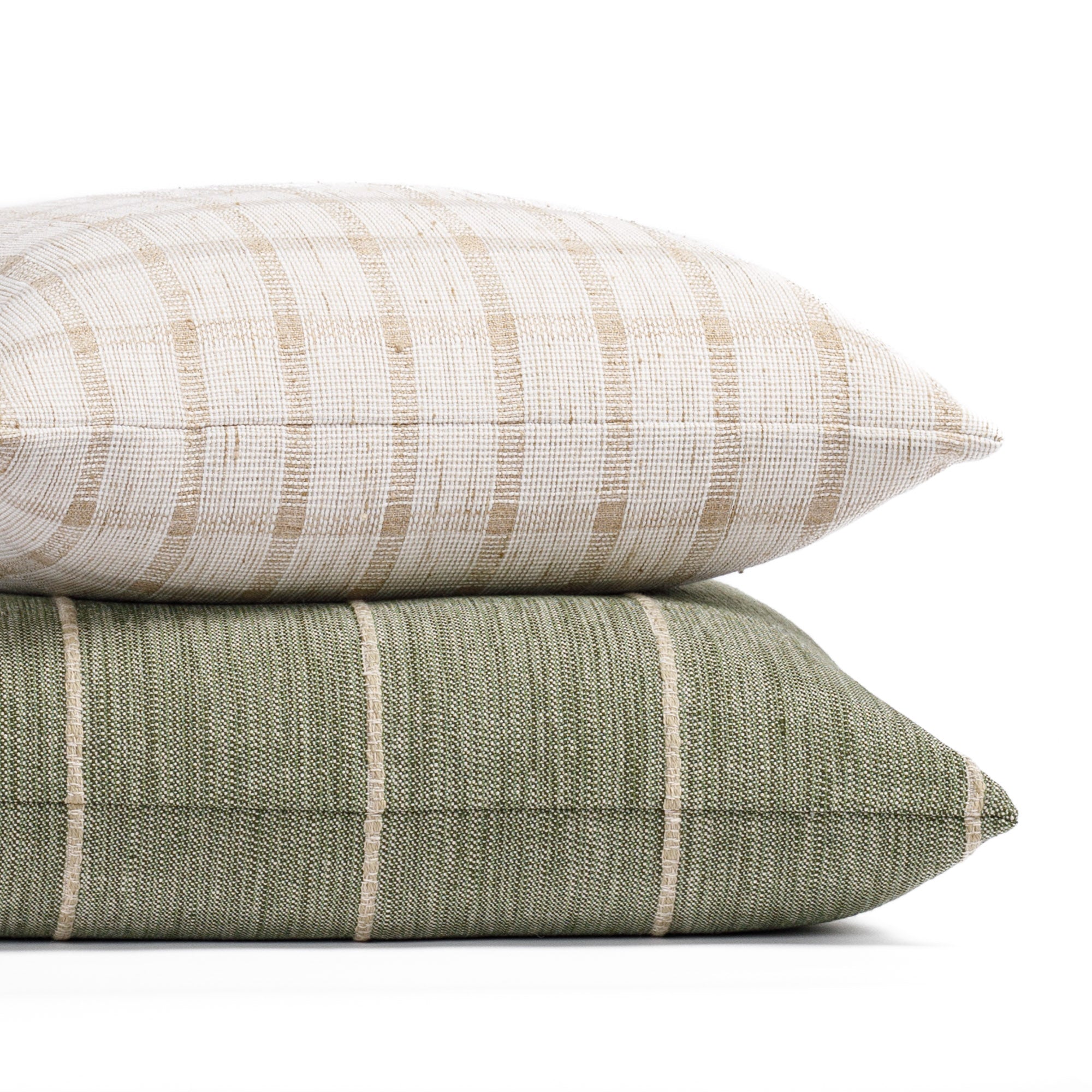 a leafy green and neutral beige pillow pairing
