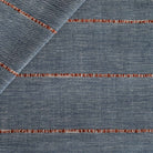 a navy blue with a chunky rust red stripe upholstery fabric