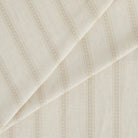 Tonic Living Brunswick Stripe fabric in off-white with subtle tone-on-tone stripes for versatile decor.