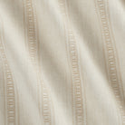 Close up of Tonic Living Brunswick Stripe home decor fabric in Parchment showing its subtle stripe texture.