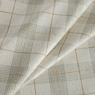 Cabot Plaid sage, an oatmeal, caramel and green woven plaid patterned upholstery fabric from Tonic Living