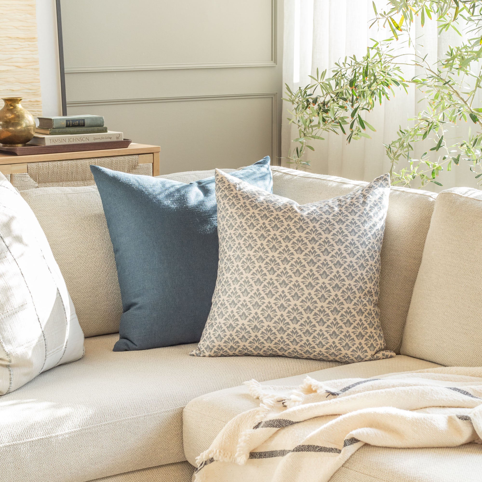 Blue and cream modern Tonic Living throw pillows