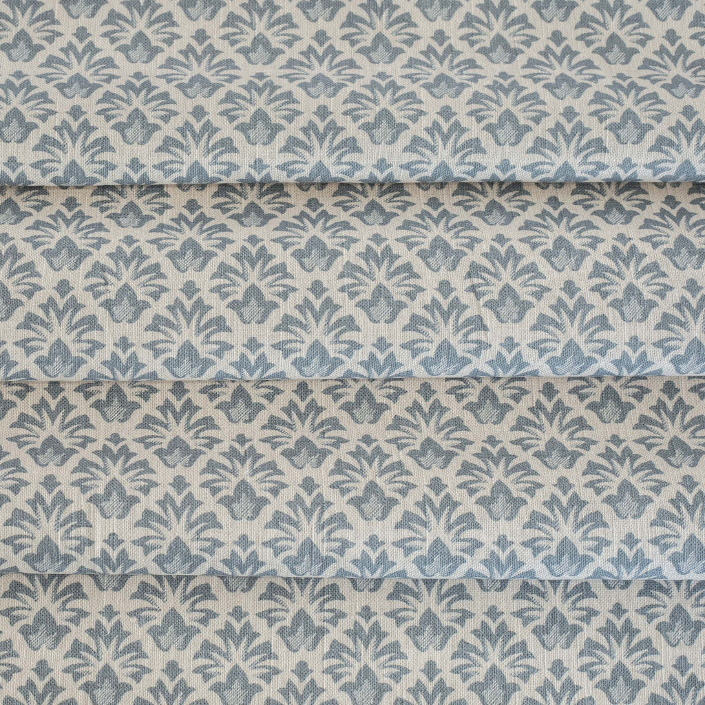 an earthy blue and sandy cream floral block print home decor fabric