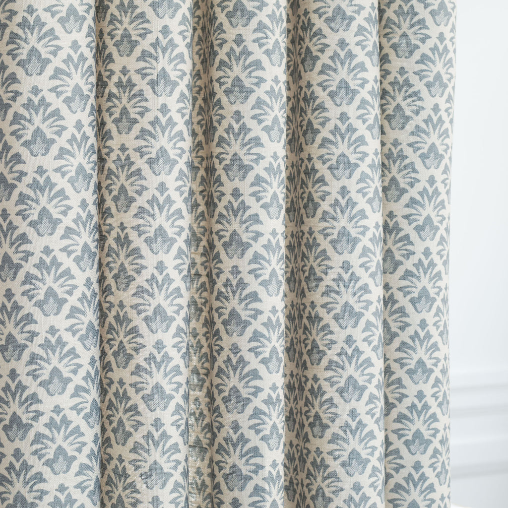 an earthy blue and sandy cream floral block print curtain fabric from Tonic Living