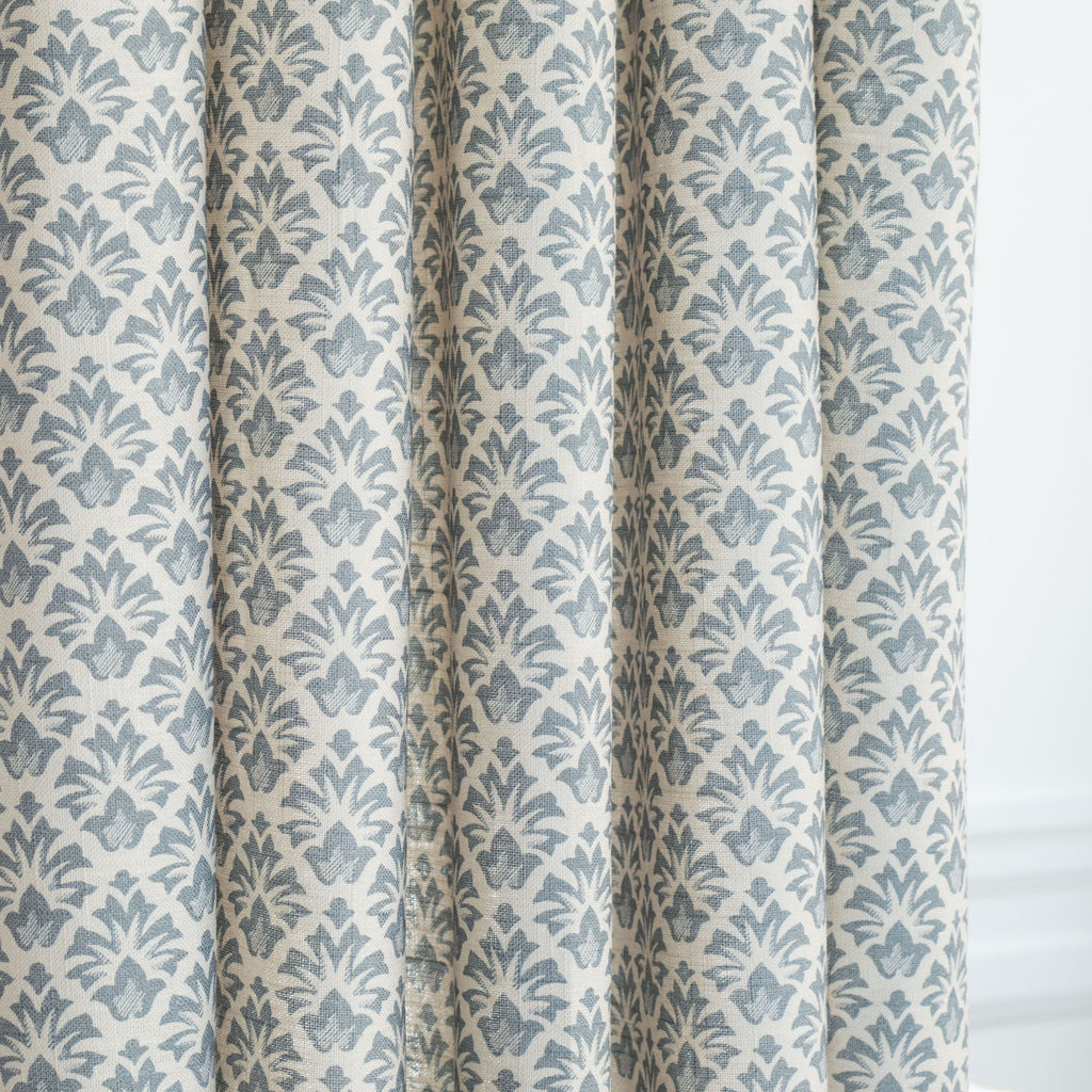 an earthy blue and sandy cream floral block print curtain fabric from Tonic Living
