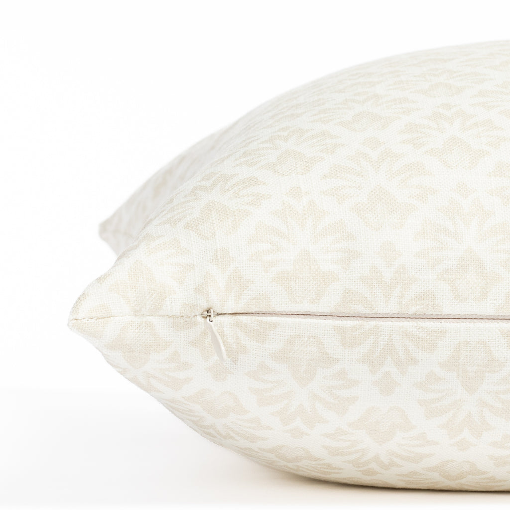 a cream and putty beige floral block print throw pillow : close up zipper view