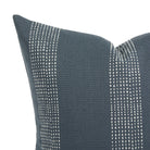 Close up of Tonic Living Caper outdoor cushion showing blue and white dotted stripe detail.