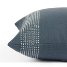 Side view of Tonic Living Caper Slate decorative cushion highlighting its textured banded stripe design.