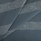 Tonic Living Caper Sunbrella Slate performance fabric featuring embroidered stripe in blue and white tones.