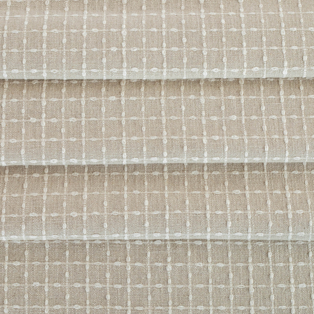 a beige with cream windowpane stitch pattern home decor fabric from Tonic Living