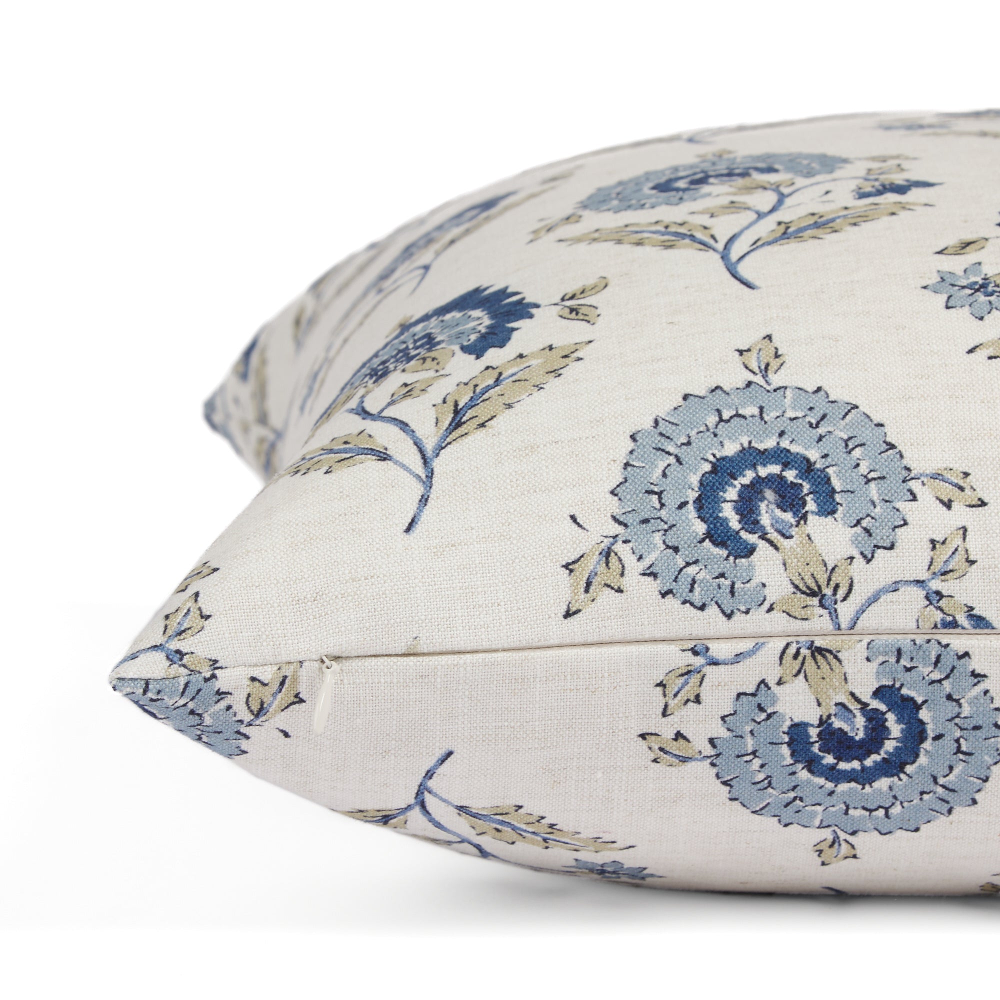 Side zipper detail of Tonic Living Clara 20x20 throw pillow in blue and white floral print.