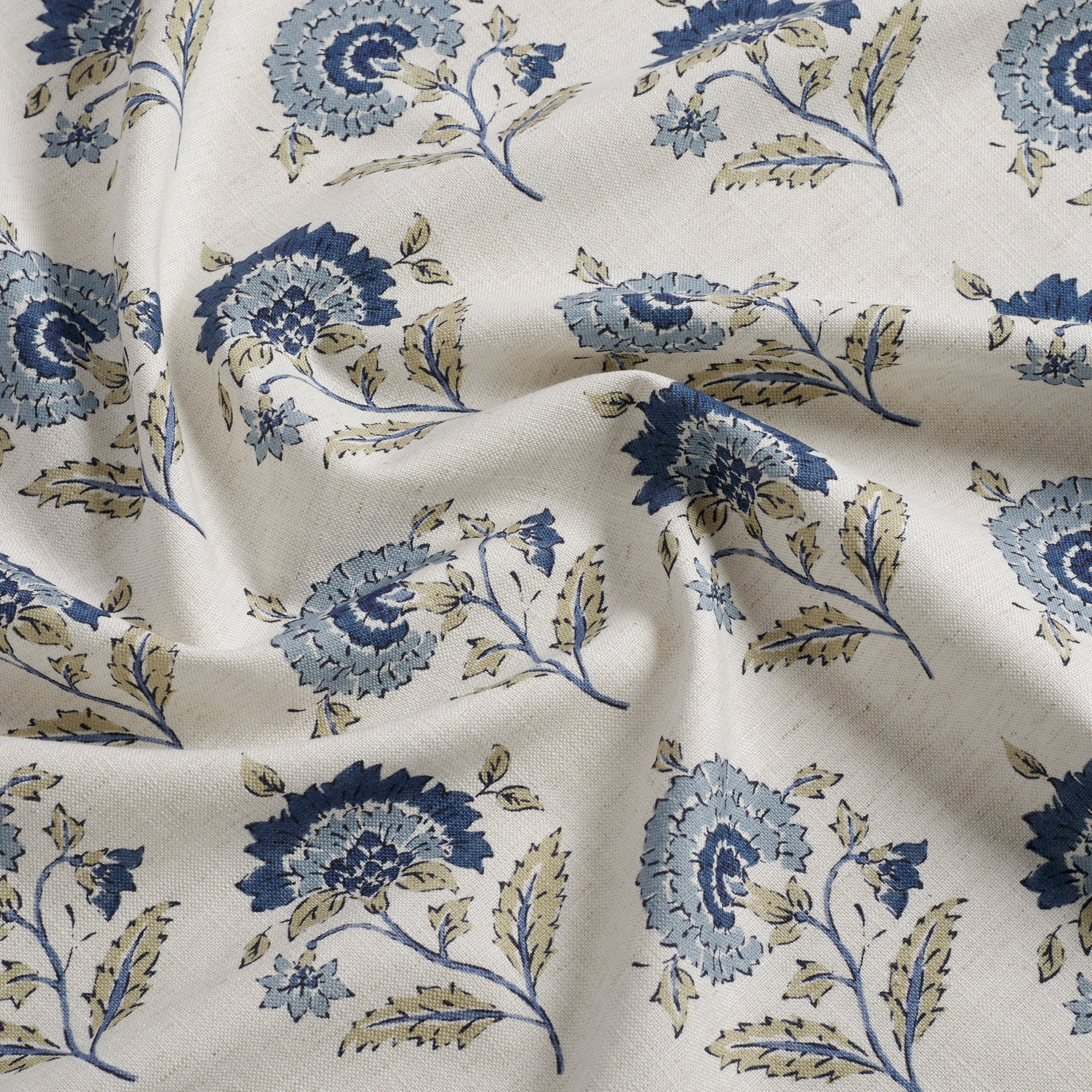 Tonic Living Clara Denim fabric featuring a soft blue floral block print design.