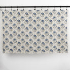 Full yard of Tonic Living Clara Denim drapery fabric showing blue floral block print pattern.