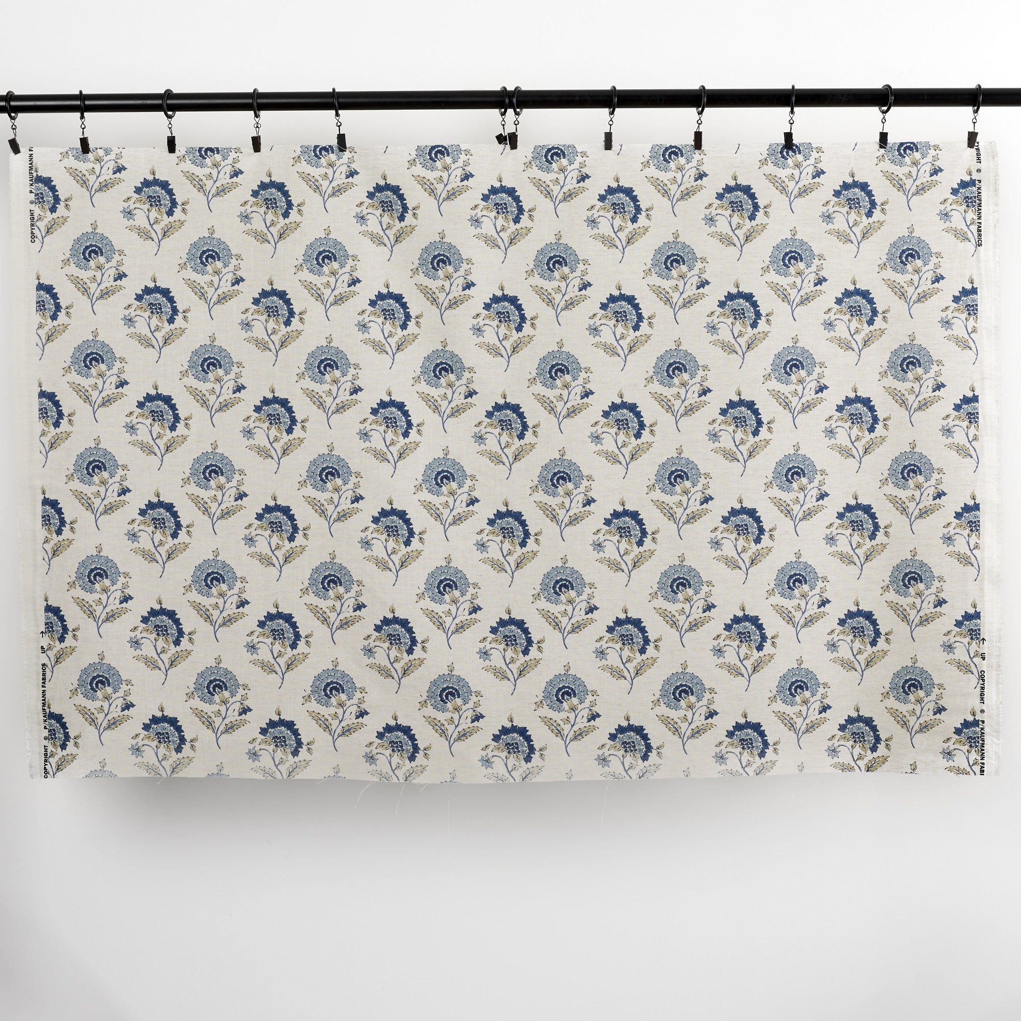 Full yard of Tonic Living Clara Denim drapery fabric showing blue floral block print pattern.