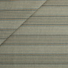 Tonic Living Clark Stripe Fabric in Pool, a faded blue, oatmeal, and camel striped high-performance upholstery fabric.