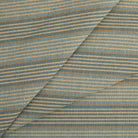 Tonic Living Clark Stripe Fabric in Pool, a blue striped high-performance fabric with oatmeal and camel accents.