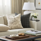 Tonic Living Colette Portobello decorative pillow styled on a sofa with the Dundee 22x22 Pillow in Sable.
