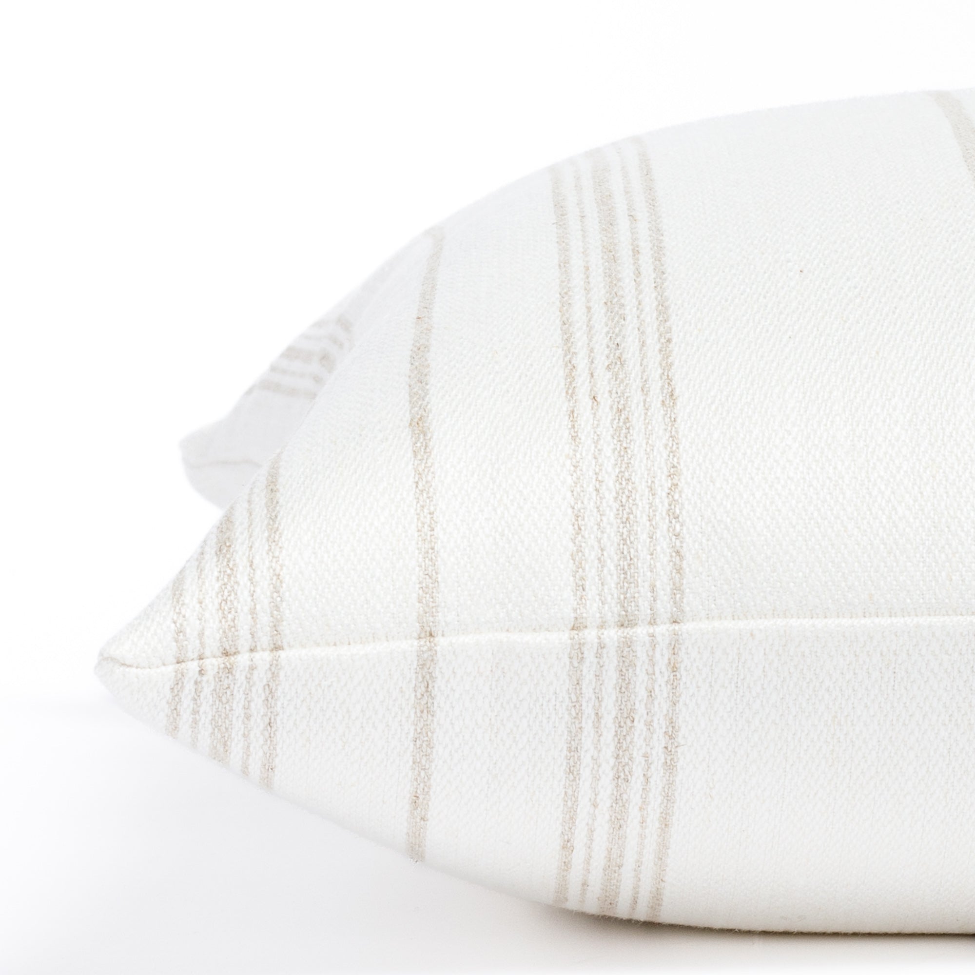 a flax beige and white vertical stripe throw pillow : side detail