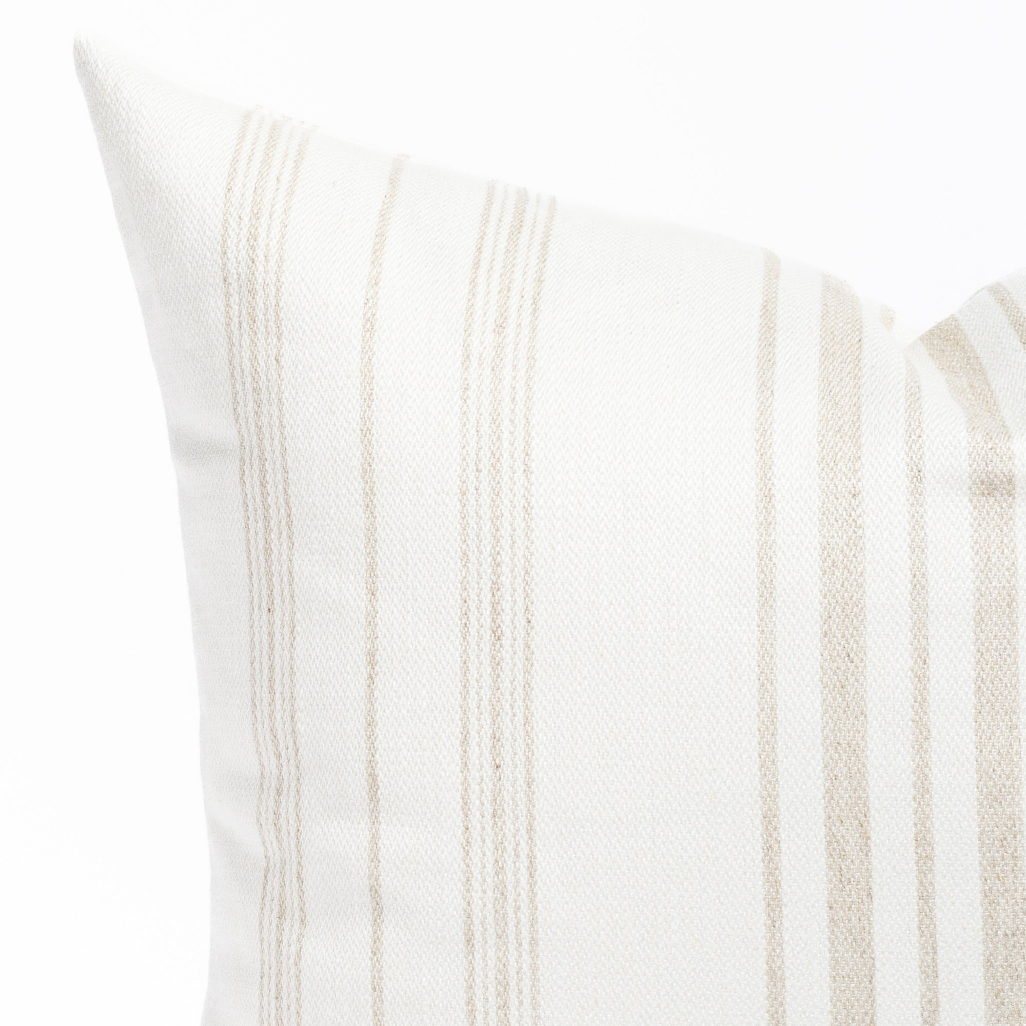 a flax beige and white striped throw pillow : corner detail