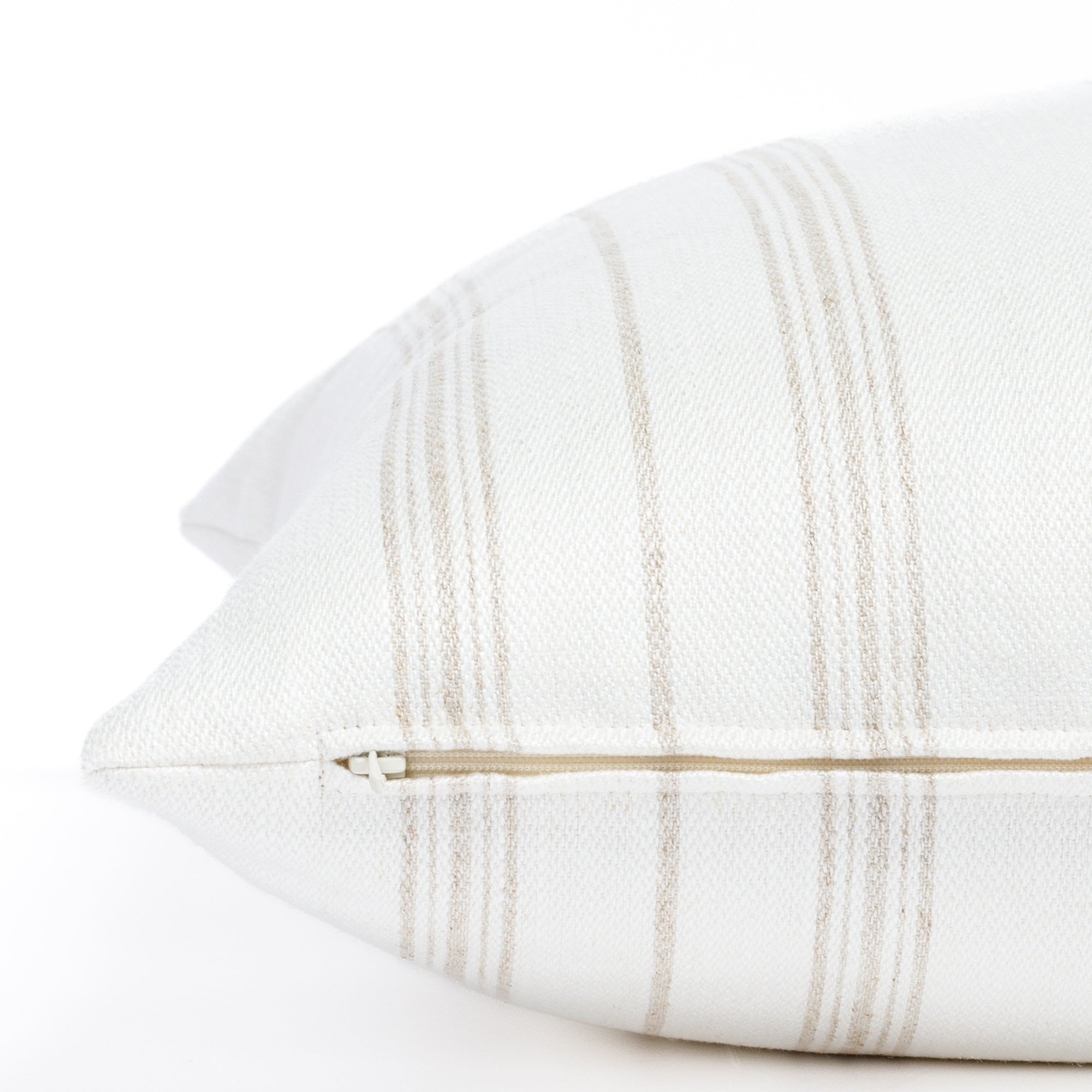 a flax beige and white striped throw pillow : zipper detail