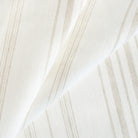 a white and beige vertical striped linen blend fabric