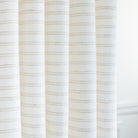 a white and beige grey stripe drapery fabric