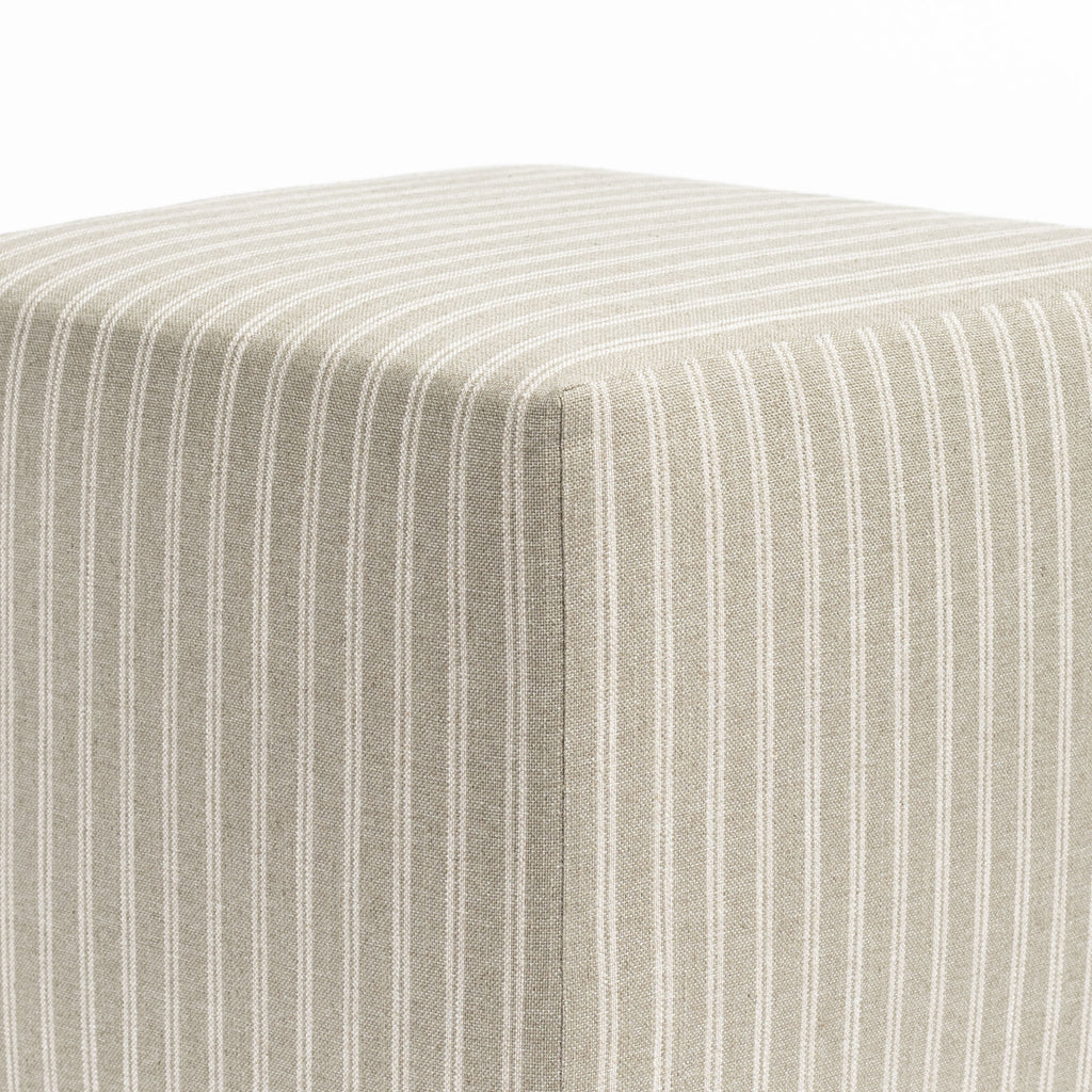 a dusty sage green and oatmeal belgian farmhouse striped fabric ottoman pouf : top corner detail view