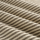 Tonic Living Crosby Stripe Truffle performance upholstery fabric featuring a refined brown and beige striped pattern.