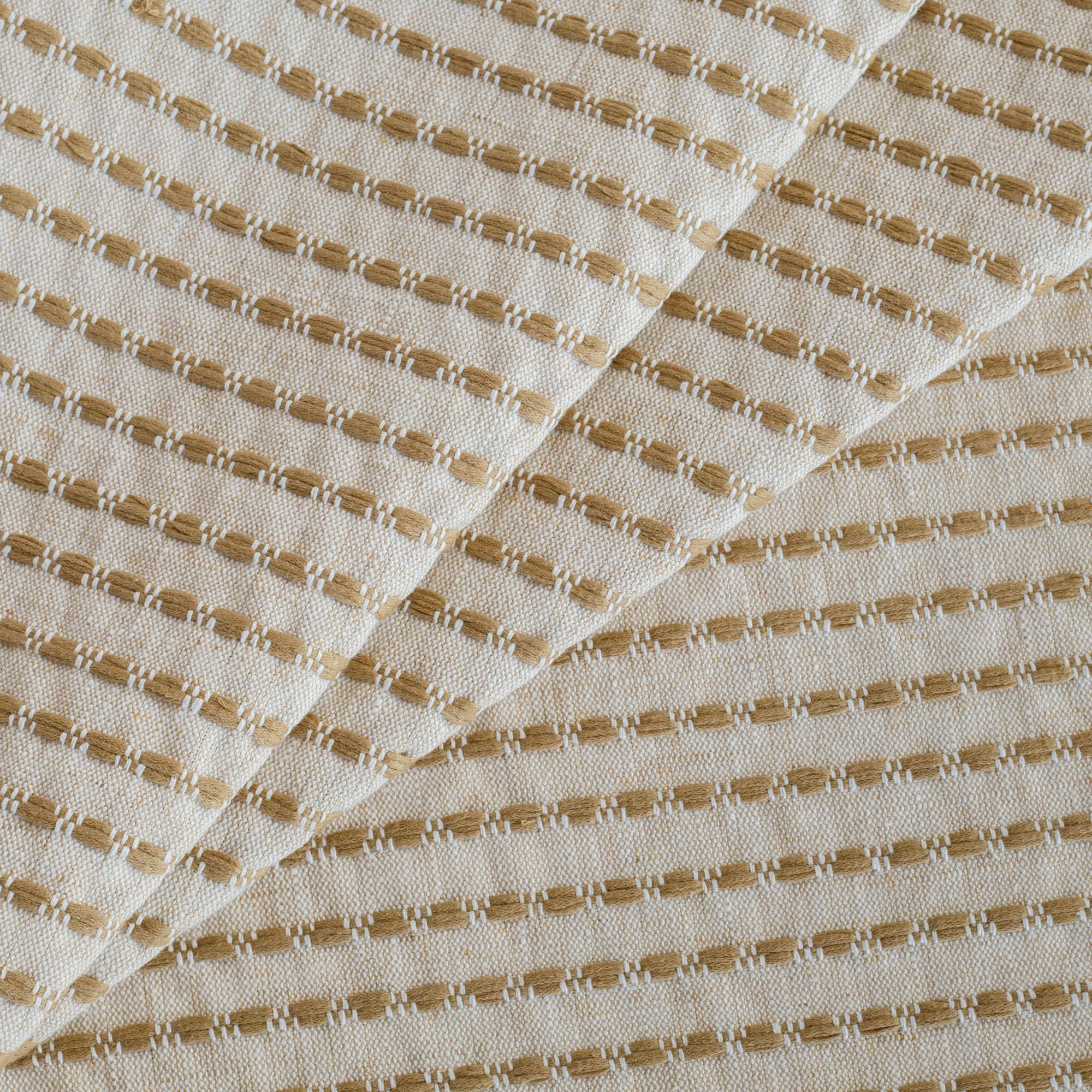 Tonic Living Dash Stripe Ochre neutral upholstery fabric with stitched stripe detail.