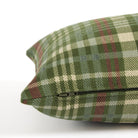 Side zipper detail of Tonic Living Dasher 14x20 Holiday Lumbar Pillow, a green plaid decorative cushion for Christmas decor.