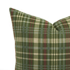 Close up of Tonic Living Dasher Holiday Pillow showing a woven plaid pattern in pine green, burgundy, beige, and chambray blue.