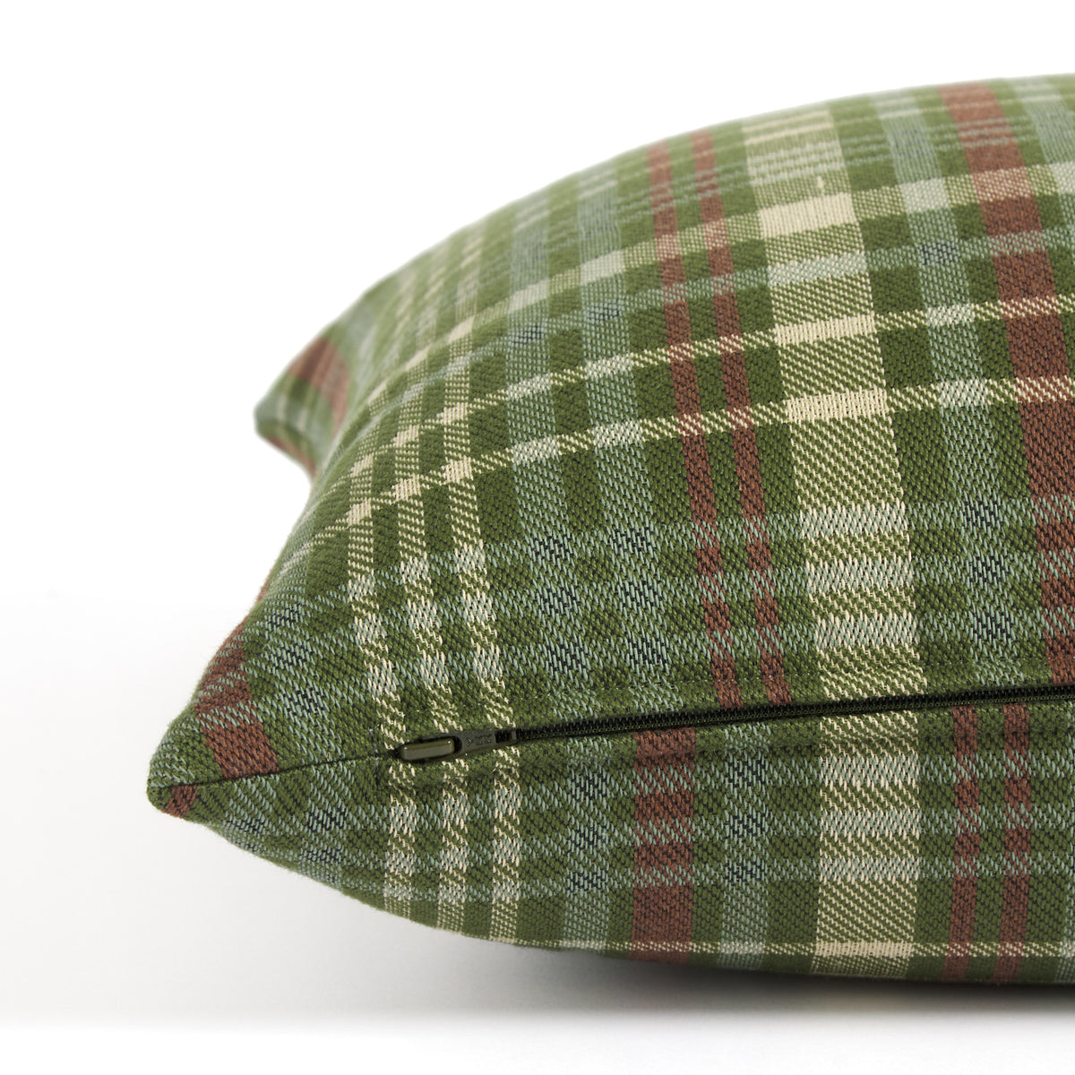 Side zipper detail of Tonic Living Dasher 20x20 Holiday Pillow, a green plaid toss cushion for Christmas decor.