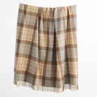 Tonic Living Duncan Plaid Wool Throw Blanket in Tweed, a brown, camel, and grey plaid wool blanket with classic fringe.