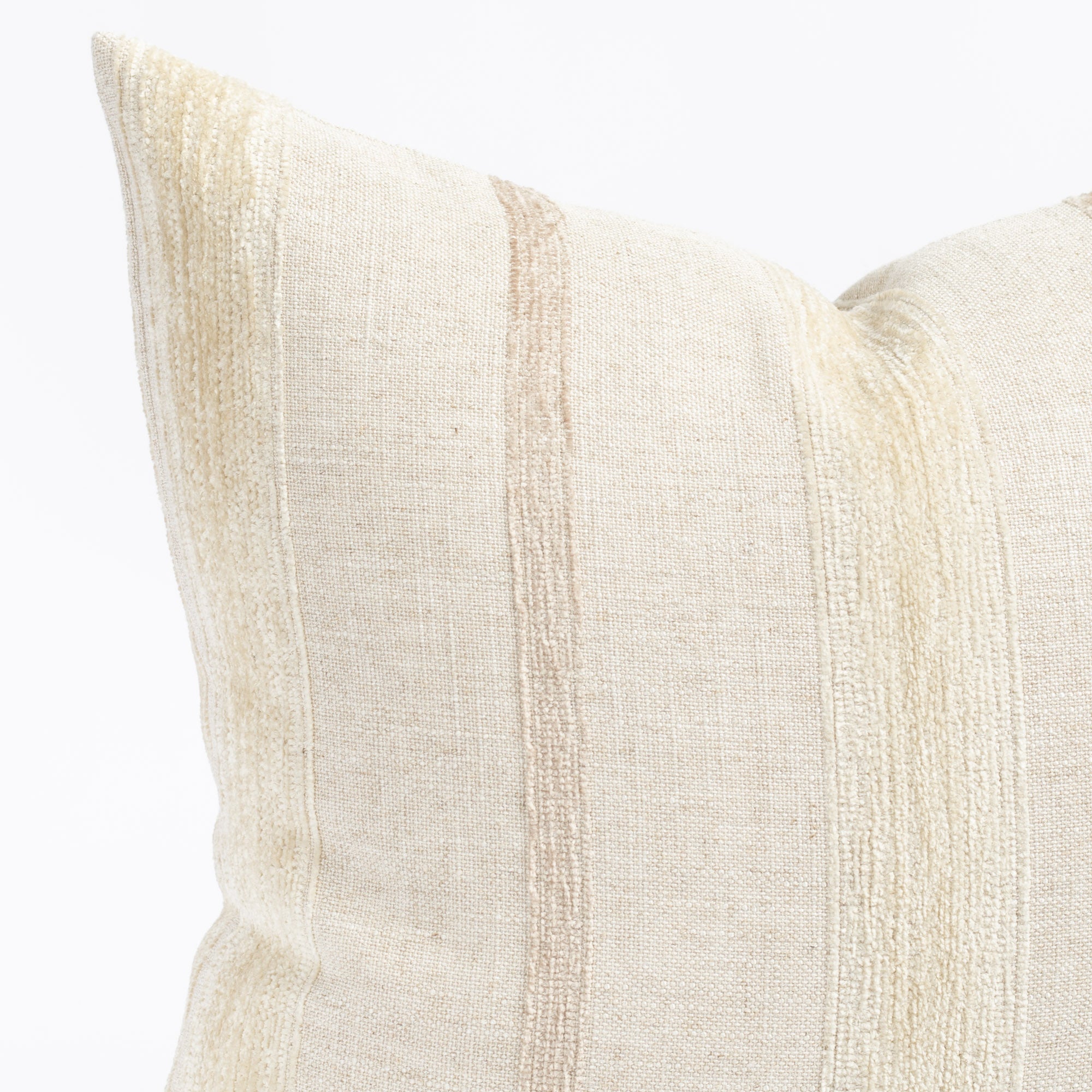 a neutral oatmeal beige tone on tone vertical chenille striped throw pillow: close up view