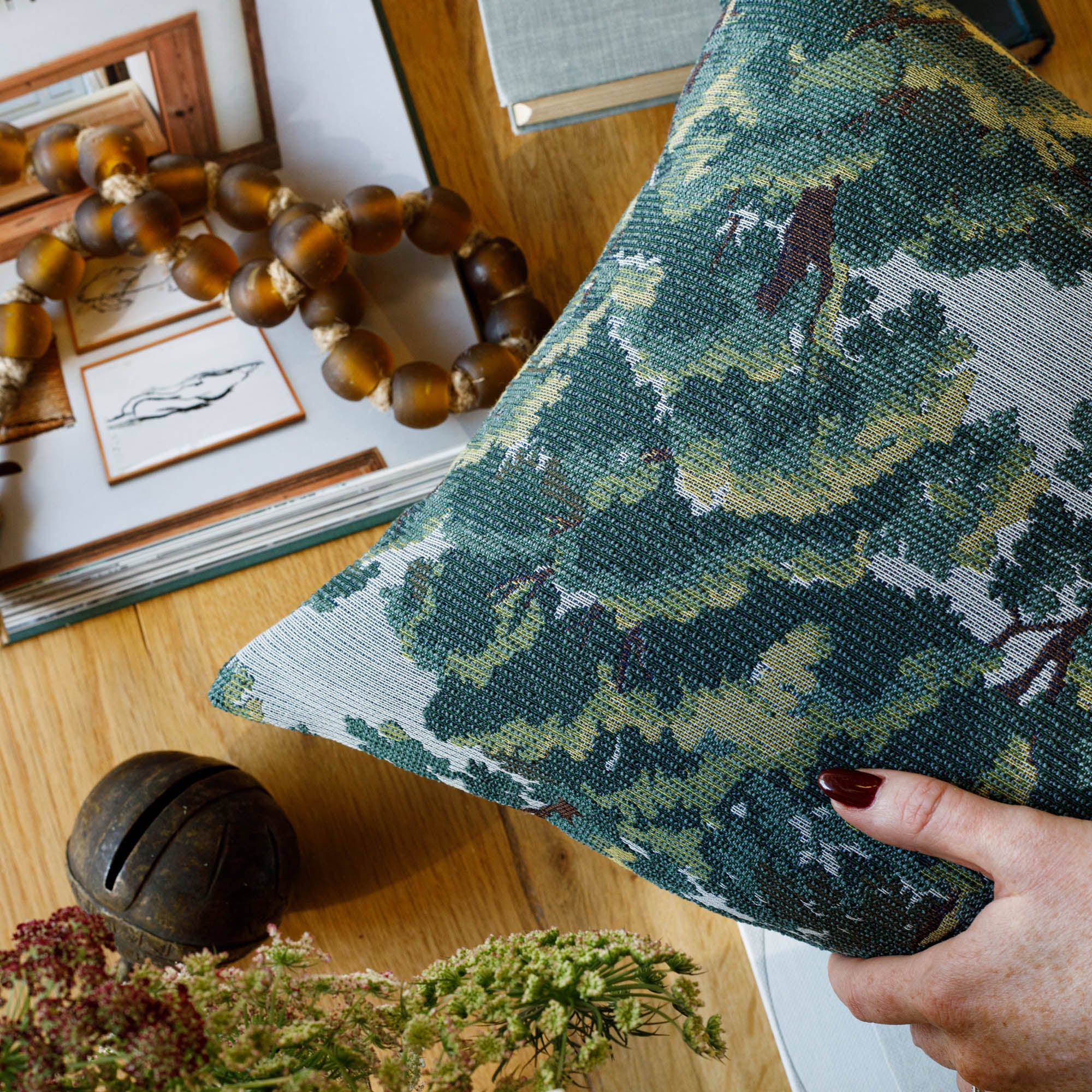 Elora Pillow :  an earthy palette of deep forest green, bark brown, and hazy sky blue