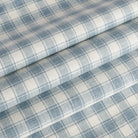 Tonic Living Emmett Plaid Denim Blue home decor fabric ideal for roman shades and curtains in a blue check.