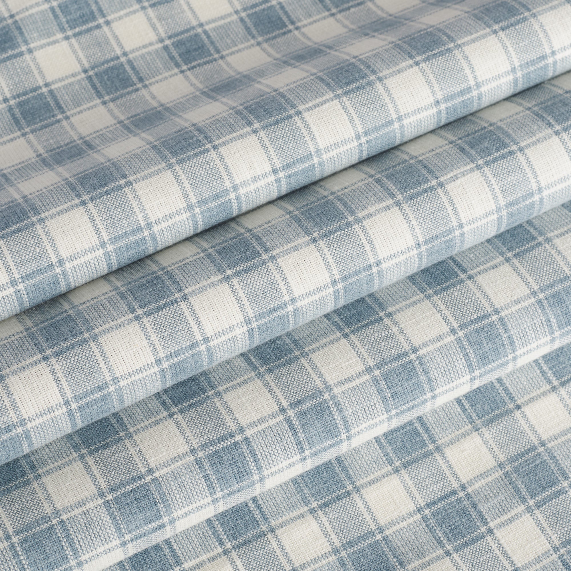 Tonic Living Emmett Plaid Denim Blue home decor fabric ideal for roman shades and curtains in a blue check.