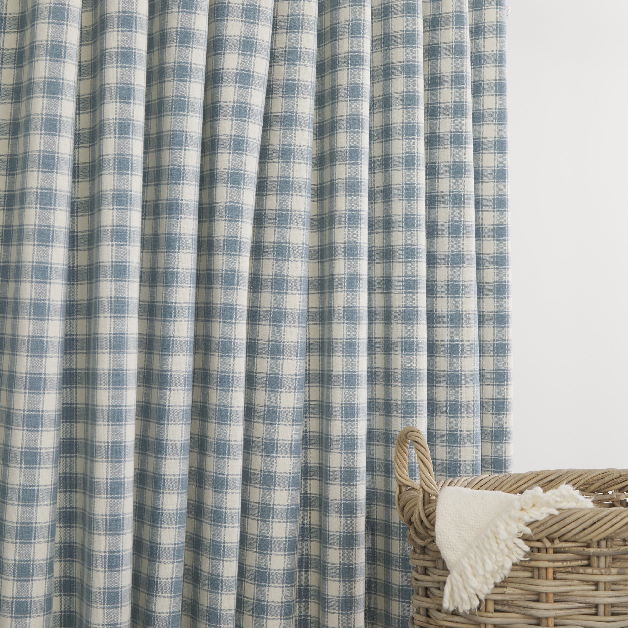 Tonic Living Emmett Plaid Denim Blue drapery fabric in a timeless soft blue and white check.