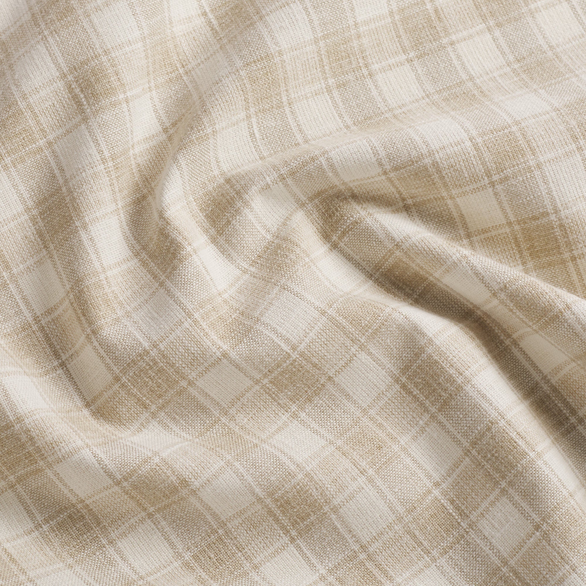 Tonic Living Emmett Plaid Flax upholstery fabric in a versatile neutral plaid with soft white and flax tones.